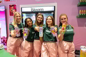 Bloom Nutrition tradeshow booth staffers