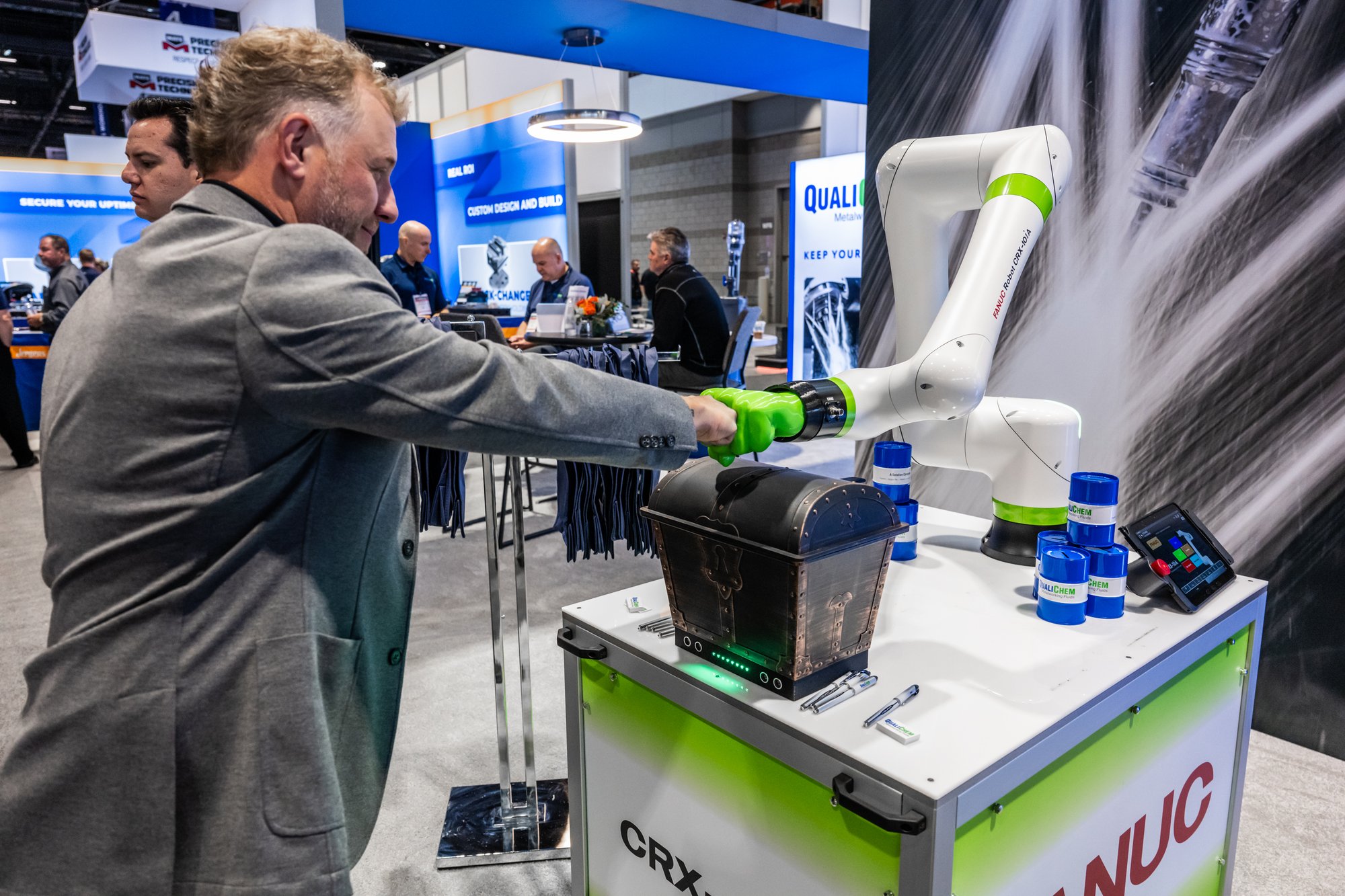 QualiChem robotic demo in booth